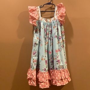 Eleanor Rose dress. Flutter sleeves with ruffle around bottom. Girls size 7/8